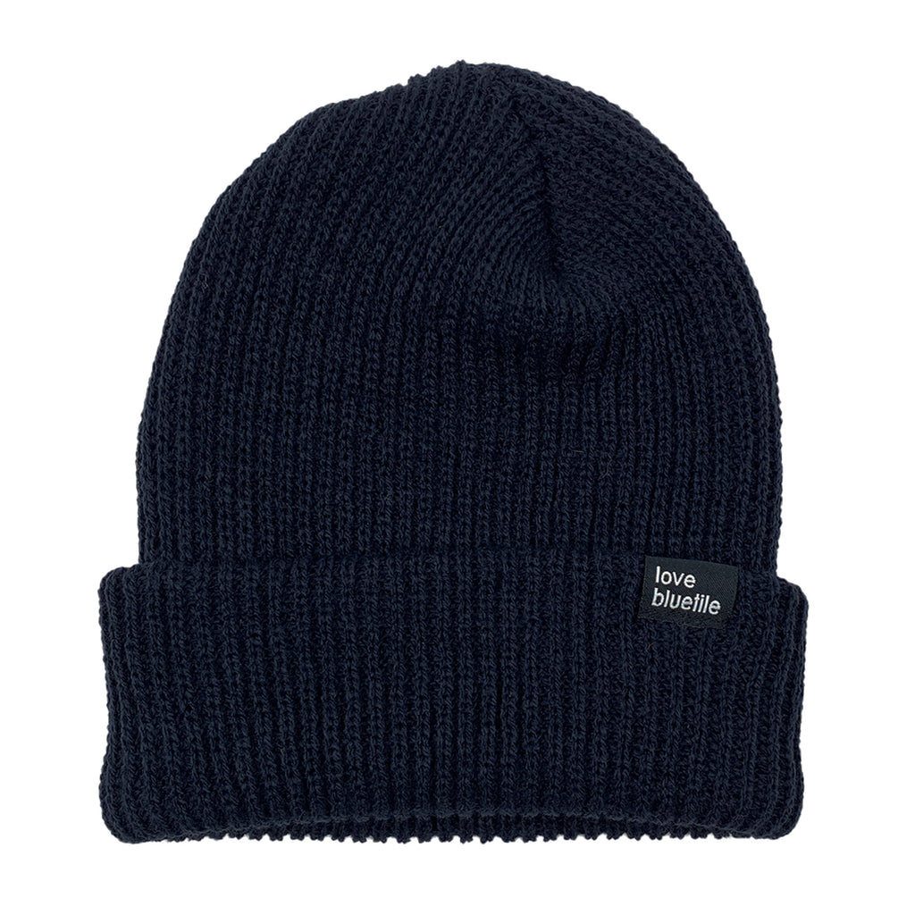 A BLUETILE LOVE ALWAYS KNIT BEANIE NAVY on a white background.