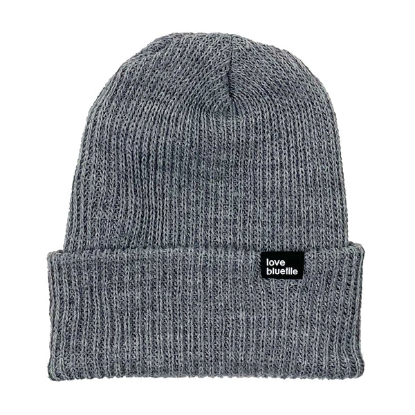 A BLUETILE LOVE ALWAYS KNIT BEANIE LIGHT GREY with a black patch on the front.