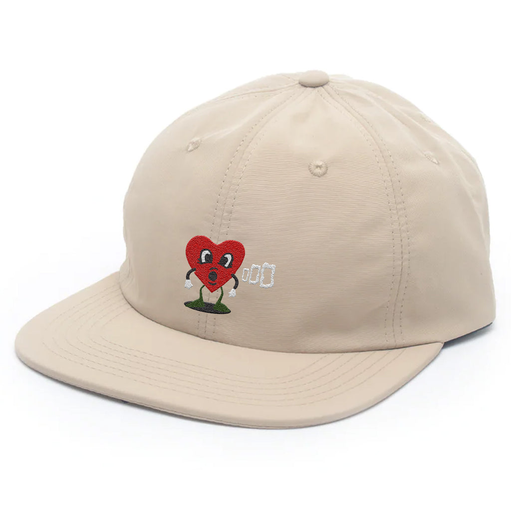 A BLUETILE SMOKE SQUARES NYLON 6 PANEL TAN hat with a red heart on it made of nylon by Bluetile Skateboards.