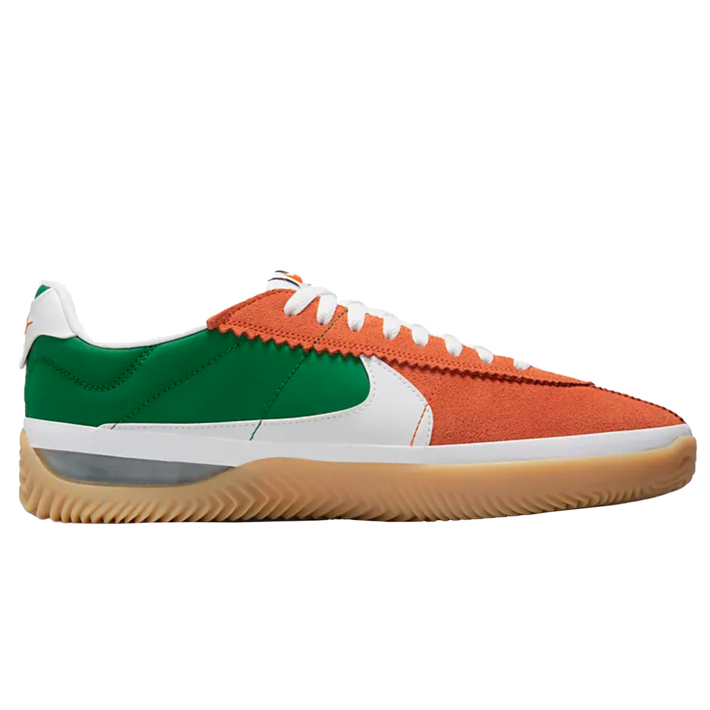 The NIKE SB BRSB DEEP ORANGE / PINE GREEN / WHITE is a sleek and stylish shoe option. With its vibrant color combination, this shoe is sure to turn heads. Whether you're a fan of the nike brand