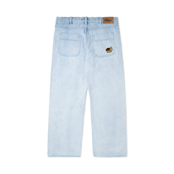 the back of light denim jeans with a lady bug embroidery on the right back pocket