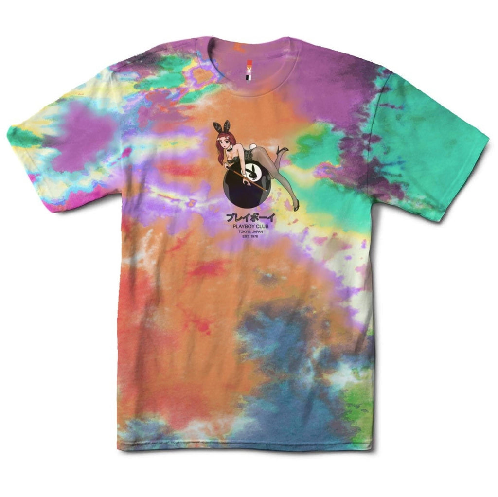 The COLOR BARS PLAYBOY 8 BALL TIE DYE TEE from COLOR BARS features a vibrant tie-dye design and a stylized graphic of a character lounging on the iconic Playboy logo.