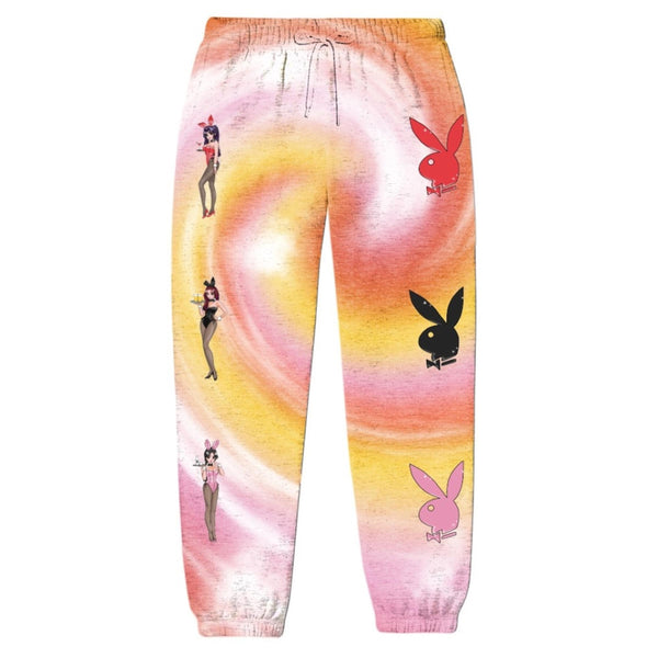 A pair of COLOR BARS sweatpants tie dye with cartoon characters on them.