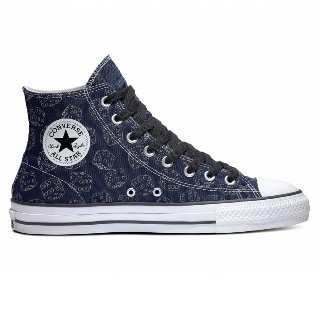 A pair of blue Converse CONS CTAS Pro Hi Dice Obsidian / Black / White with skulls on them.