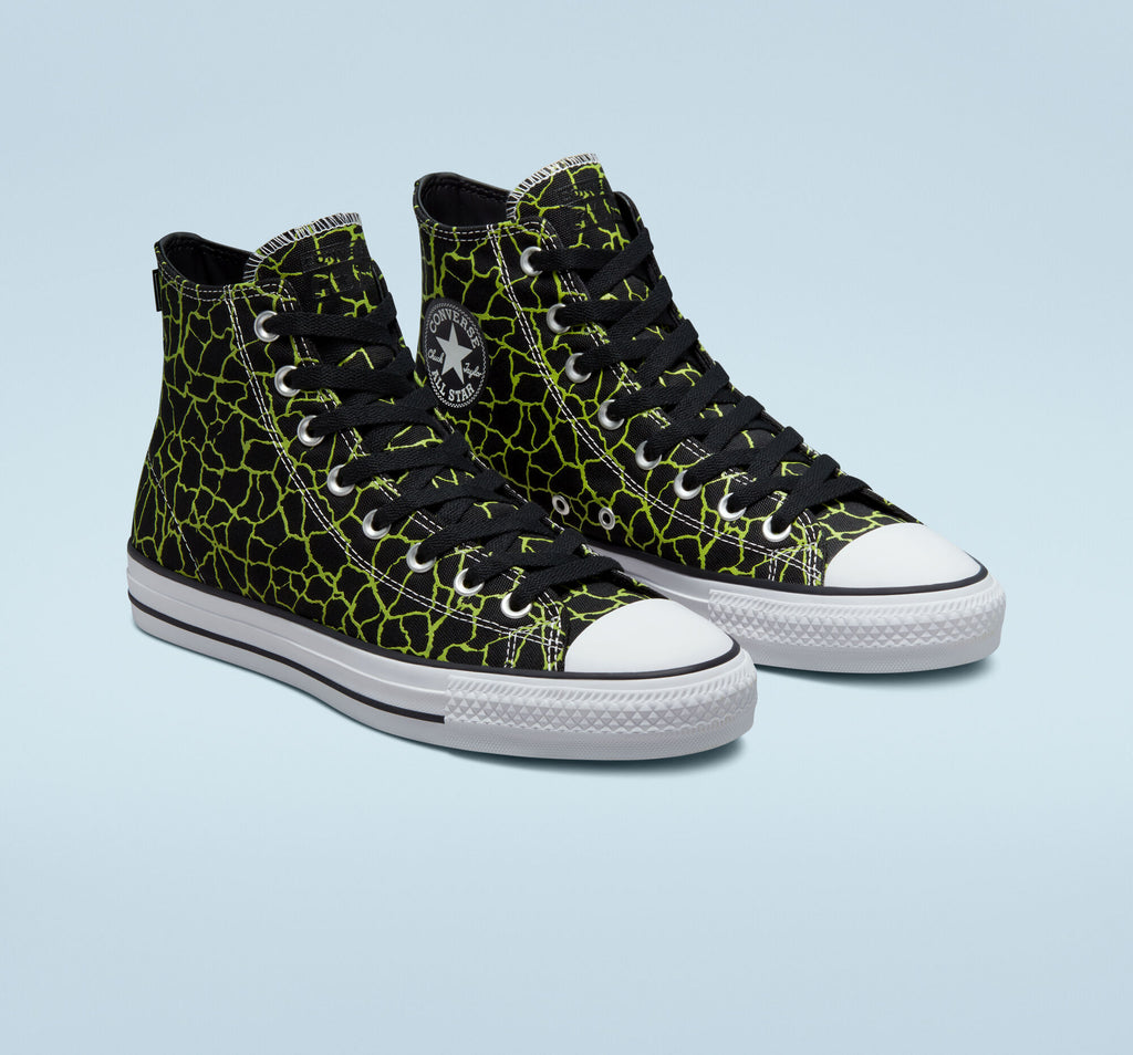A pair of CONVERSE CONS CHUCK TAYLOR ALL STAR PRO HI BLACK/LIME TWIST/WHITE high top sneakers.