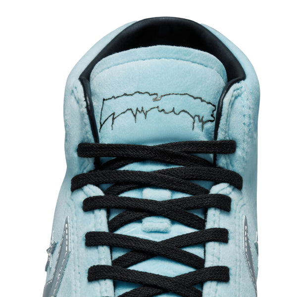 A pair of CONVERSE LOUIE LOPEZ X FA PRO MID CYAN TINT / BLACK sneakers.