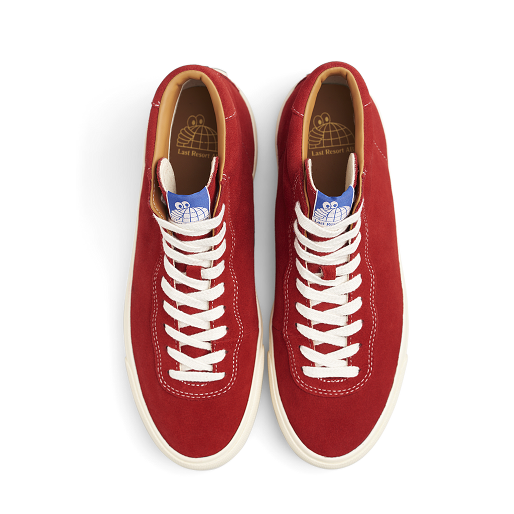 An old pair of red LAST RESORT AB sneakers with white laces, perfect as a last resort option.