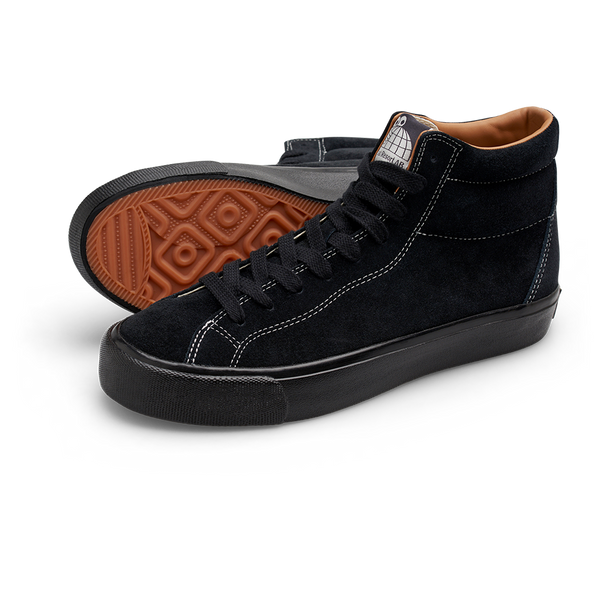 A pair of Last Resort AB VM003 Suede Hi Black/Black/White shoes with brown soles.