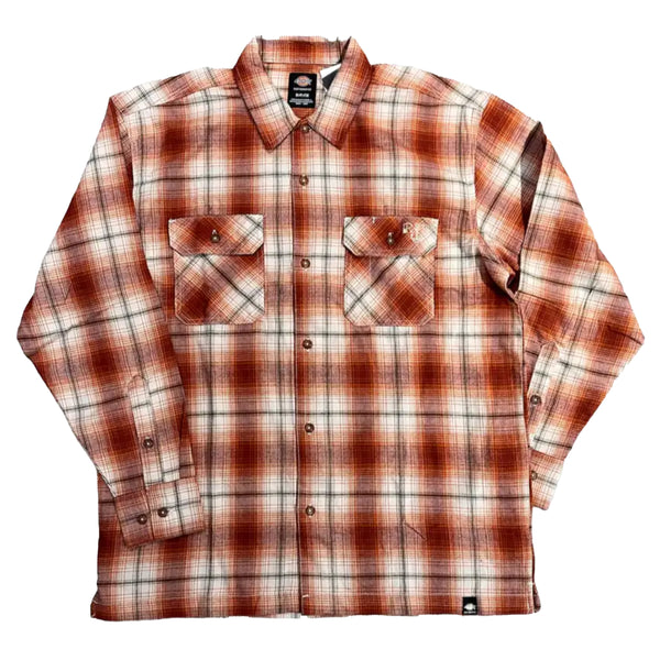 A DICKIES RONNIE SANDOVAL BRUSHED FLANNEL SHIRT BURNT OMBRE with a black patch on the chest.
