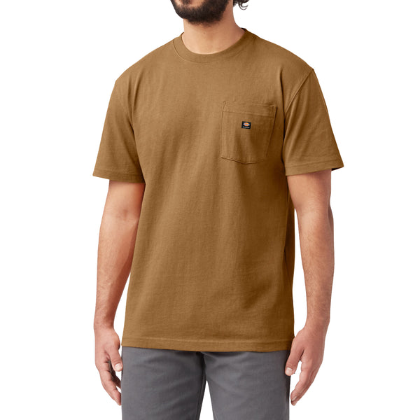 A man wearing a brown DICKIES SKATEBOARDING HEAVYWEIGHT POCKET TEE BROWN DUCK.