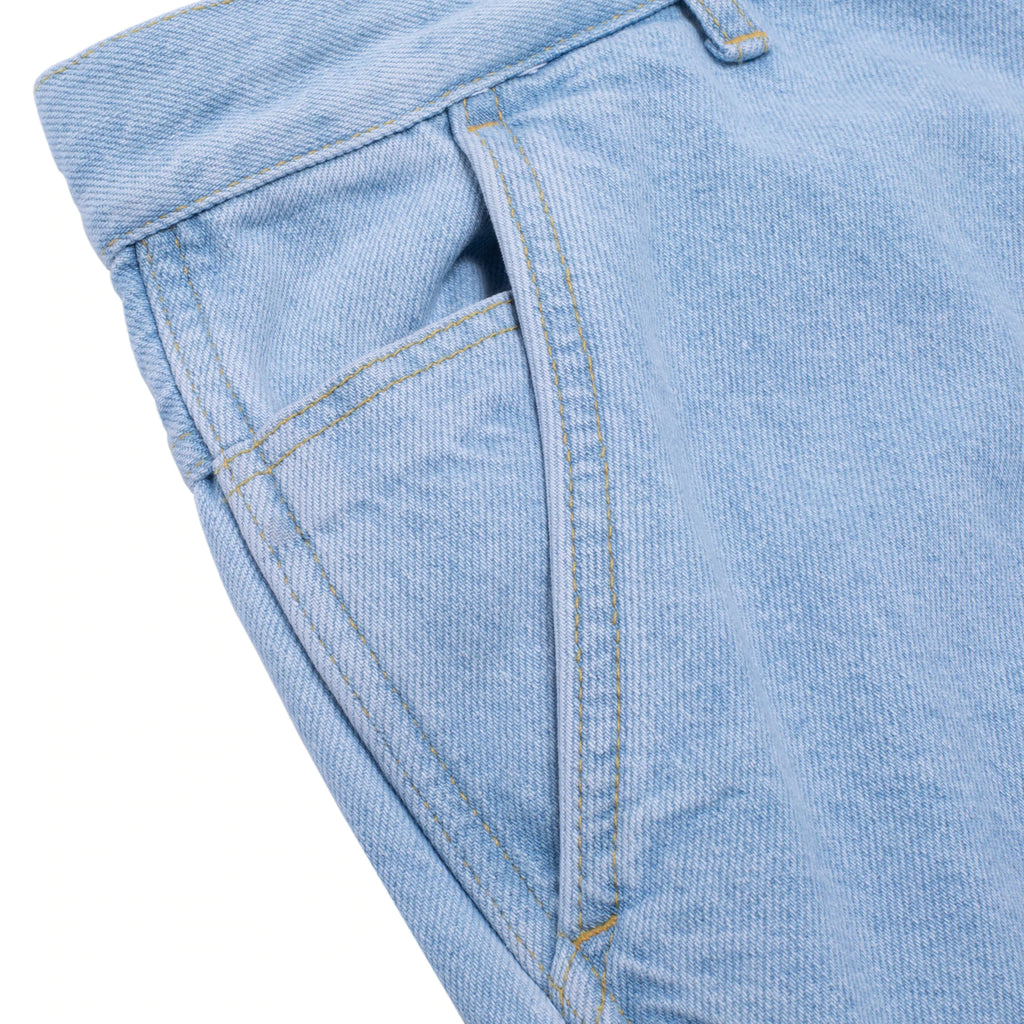 A close up of a pair of FUCKING AWESOME BAGGY ZIP OFF CARPENTER PANTS LIGHT DENIM.
