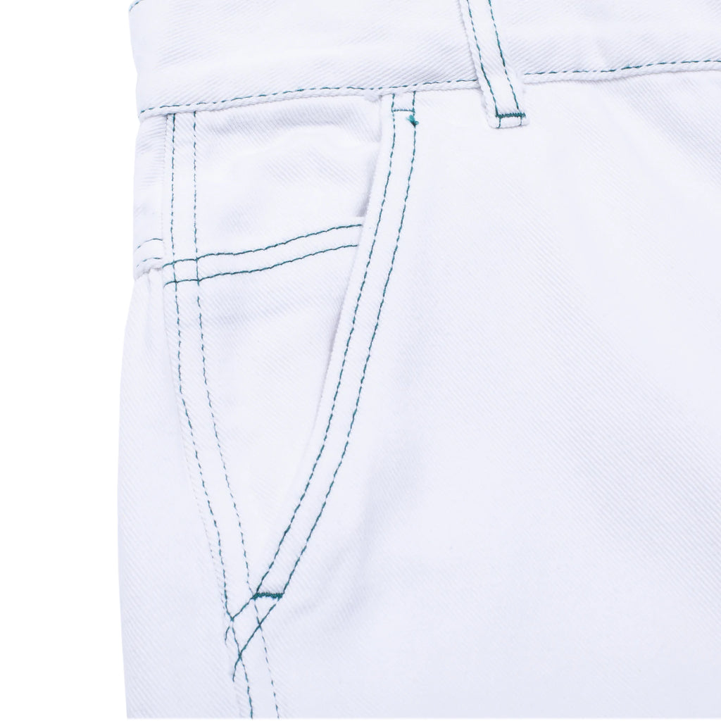 A close up of a pair of white FUCKING AWESOME BAGGY ZIP OFF CARPENTER PANTS.