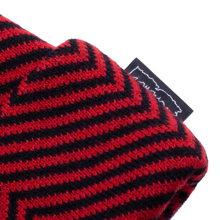 A close up of a FUCKING AWESOME HURT YOUR EYES BEANIE RED.