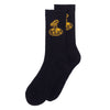 The FUCKING AWESOME FLEA SOCK BLACK / GOLD by FUCKING AWESOME features black cotton with gold-yellow graphics of a figure atop a grid, offering standout style.
