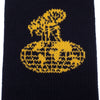 The FUCKING AWESOME FLEA SOCK BLACK / GOLD features a gold abstract emblem knitted onto black cotton fabric for a bold, eye-catching look.
