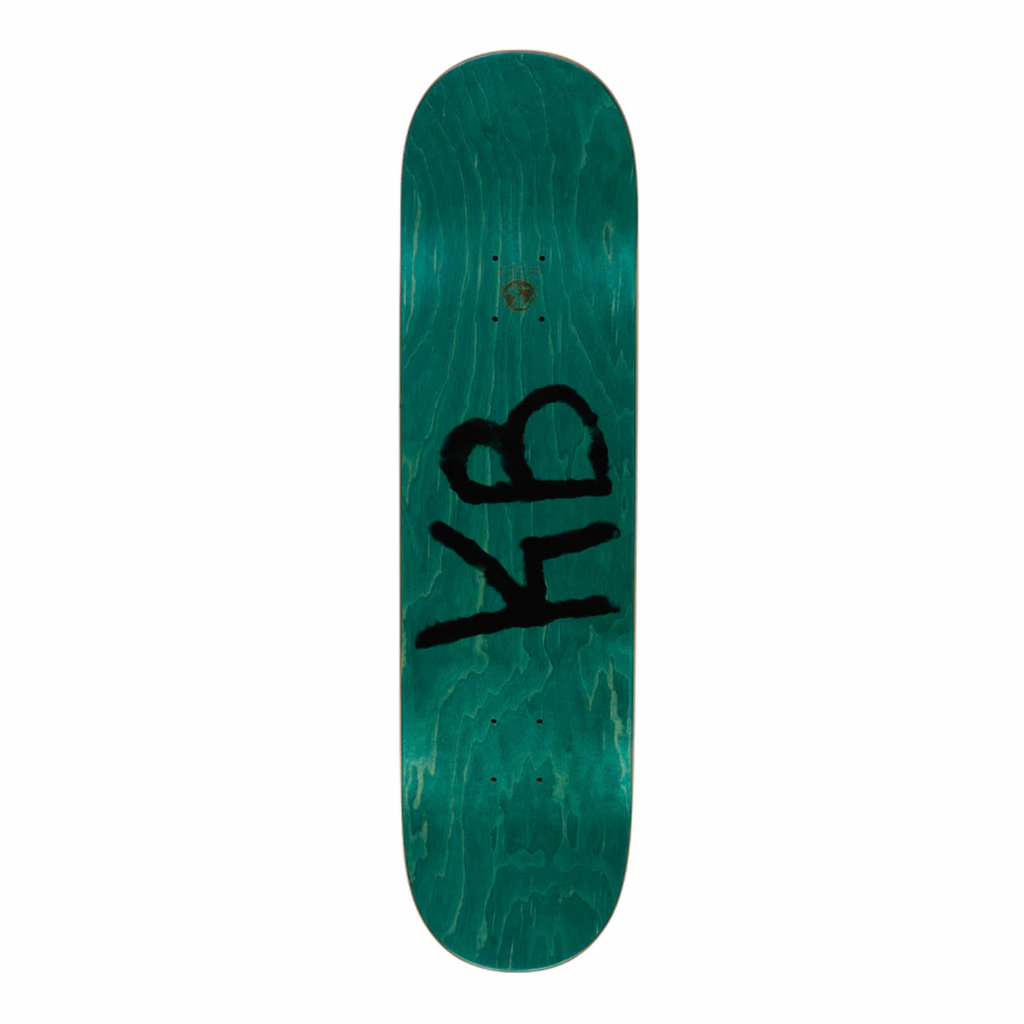 The top of a skateboard with teal stain and spray-painted letters KB.