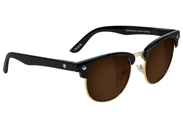 A pair of GLASSY SUNHATERS MORRISON POLARIZED BLACK/BROWN sunglasses on a white background.