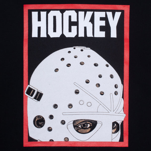 A HOCKEY HALF MASK HOODIE BLACK printed on a black shirt from the brand HOCKEY.