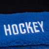 A close up of a towel with the word HOCKEY SHEPHERD BEANIE BLACK / BLUE by HOCKEY on it.