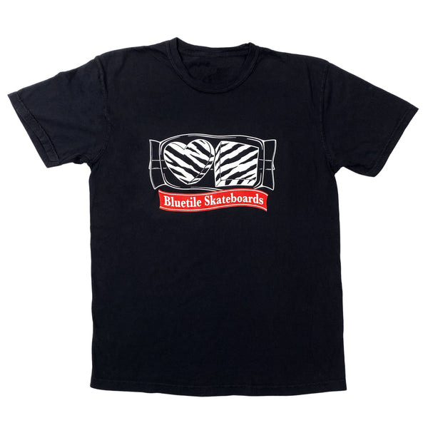 A BLUETILE CAKES TEE BLACK with an image of a zebra on it, made by Bluetile Skateboards.