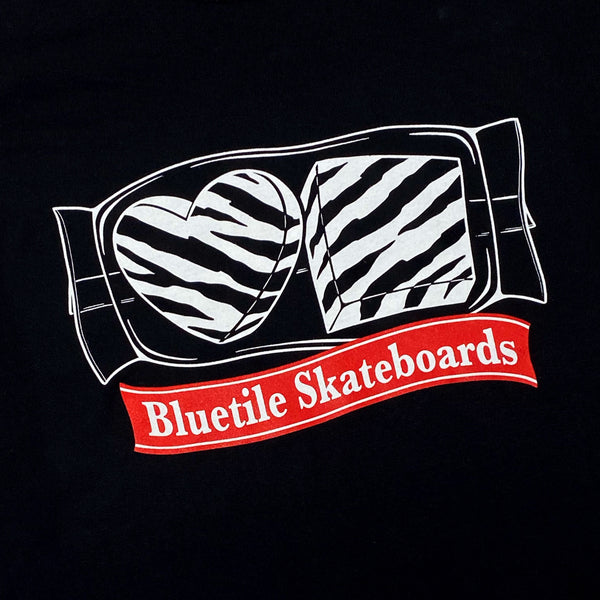 A BLUETILE CAKES TEE BLACK with zebra stripes and a heart on it by Bluetile Skateboards.