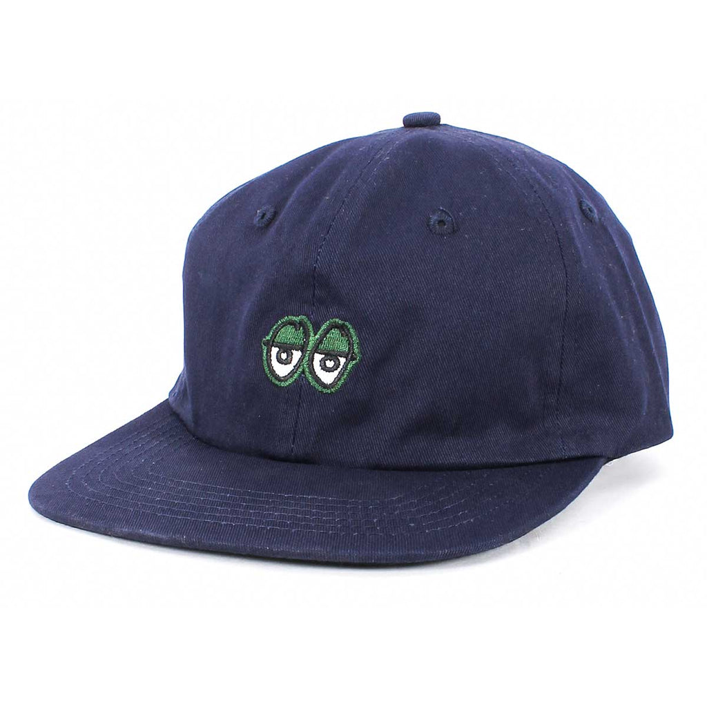 A KROOKED EYES STRAPBACK NAVY/DARKGREEN hat with a KROOKED eye on it.