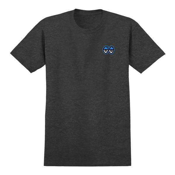 The KROOKED STRAIT EYES TEE HEATHER GREY by DELUXE is a heather gray tee that features a small design of two blue "Strait Eyes" on the upper left chest area.