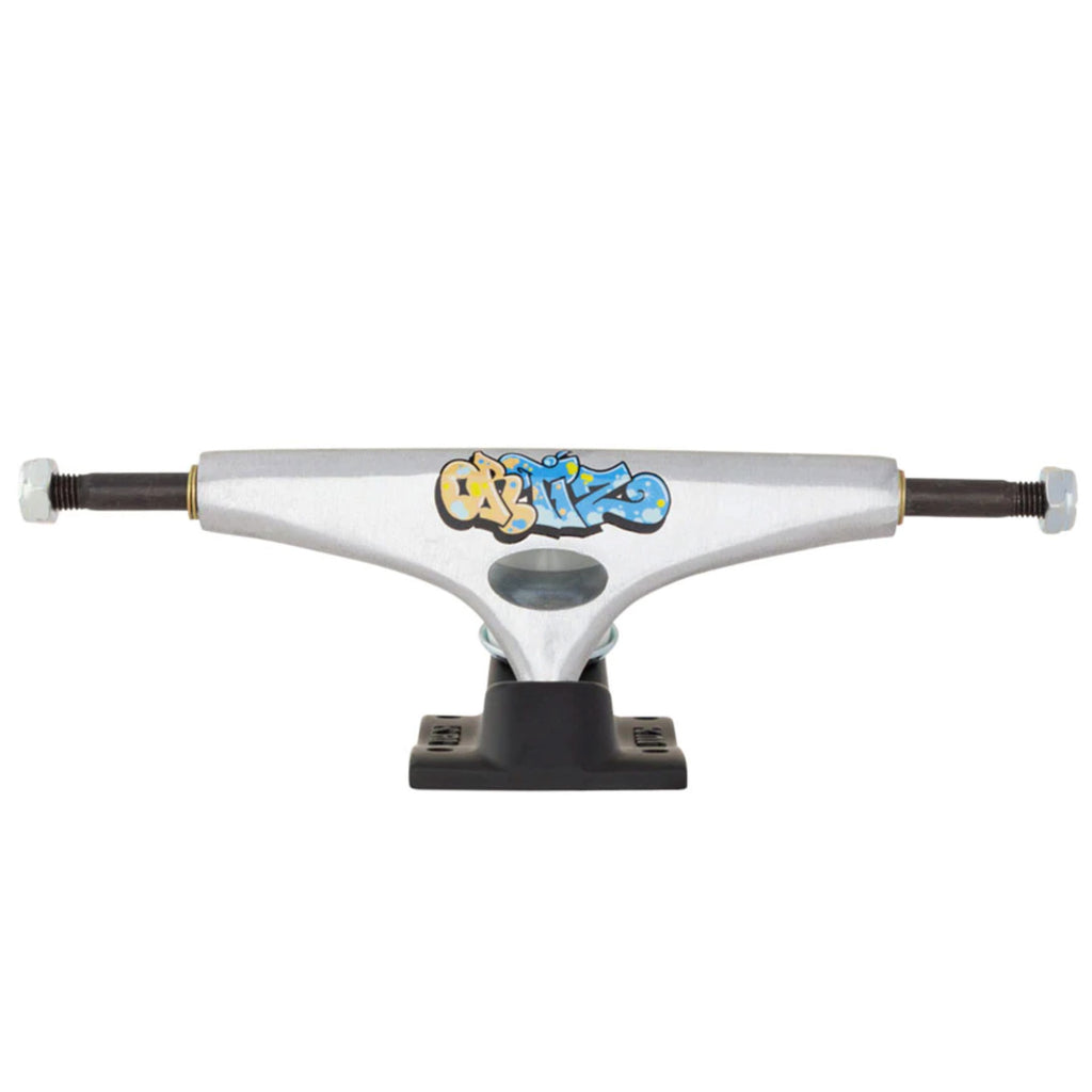 A white KRUX skateboard truck with a blue logo of DLK on it.