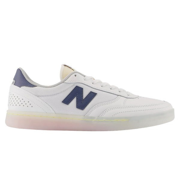 A white and blue NB Numeric 440 sneakers by New Balance.