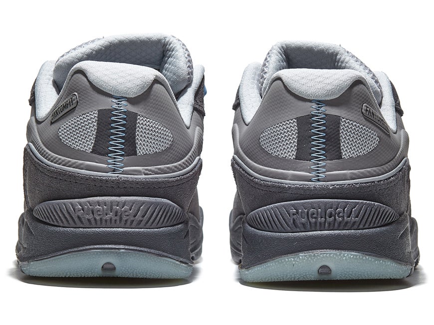 A pair of NB NUMERIC TIAGO 1010 GREY / BLUE sneakers on a white surface.