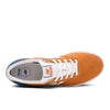 A pair of NB Numeric 272 Orange/Blue sneakers by NB Numeric with sleek white soles.
