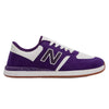A purple and white NB Numeric 420 shoes by NB Numeric.