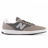 A grey and white NB Numeric 440 Challenger sneakers by NB Numeric.