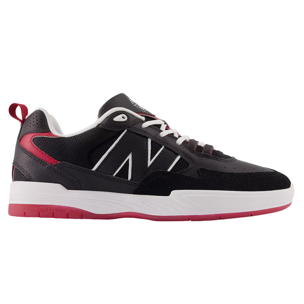 A NB NUMERIC 808 TIAGO BLACK / RED sneaker with a white sole.