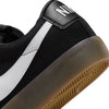A pair of Nike SB Blazer Low Pro GT black/white/gum sneakers.