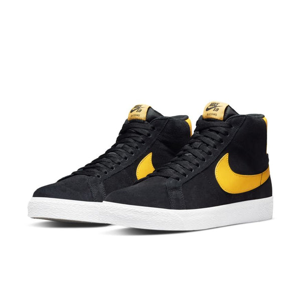A pair of black nike NIKE SB BLAZER MID BLACK / UNIVERSITY GOLD high-top sneakers with University Gold swoosh logos and white soles.