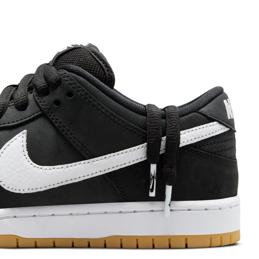 The NIKE SB DUNK LOW BLACK / WHITE / GUM from nike is black and white.
