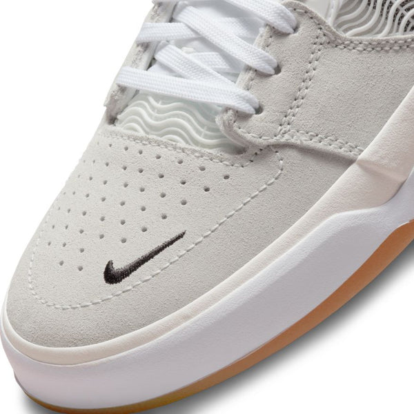 The NIKE SB ISHOD SUMMIT WHITE / WHITE in white and gum colorway. This iconic sneaker is perfect for Skateboarders and fans of Nike SB.