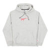The nike NIKE SB OSKI ORANGE LABEL HOODIE GREY features a front pocket and a small red and white OSKI Orange Label logo on the chest.