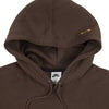 Close-up of the NIKE SB OSKI ORANGE LABEL HOODIE BROWN by nike, showing a small yellow embroidered fish on the chest and an inner neckline tag.