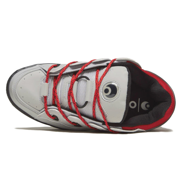 A close up of an OSIRIS D3 OG GREY/BLACK/RED shoe with red laces.