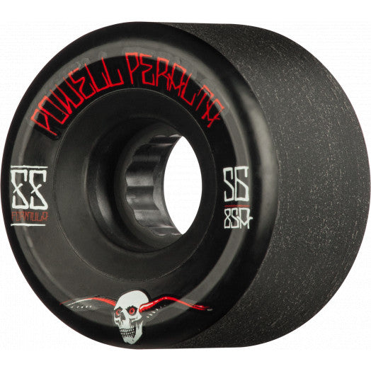 A black POWELL PERALTA G-SLIDES 59MM 85A BLACK skateboard wheel with a skull on it from POWELL PERALTA.
