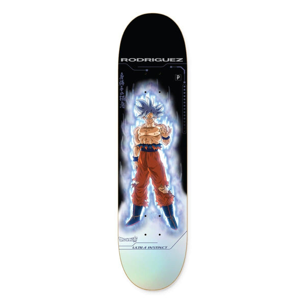 The PRIMITIVE DB SUPER P. ROD ULTRA INSTINCT skateboard deck by PRIMITIVE features an anime character in an action pose with glowing blue and white energy and "Rodriguez" at the top, inspired by Dragon Ball Super.