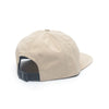 The back of a BLUETILE SMOKE SQUARES NYLON 6 PANEL TAN cap with a black buckle made of nylon, by Bluetile Skateboards.