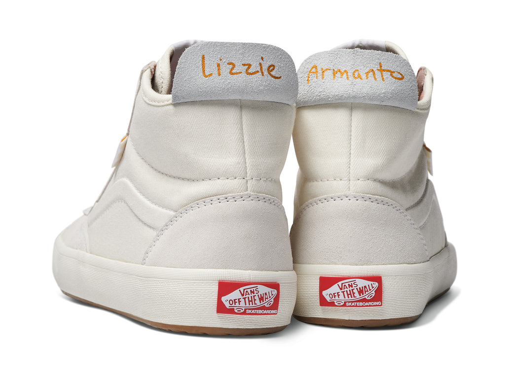 A pair of VANS THE LIZZIE MARSHMALLOW sneakers, designed for durability and skateboarding performance.