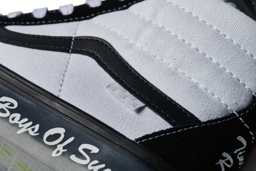 A close up of a VANS BOYS OF SUMMER SKATE SK8-HI VCU with a white and black shoelace.