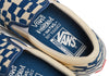 A pair of VANS SKATE SLIP ON KROOKED RAY X NATAS skate shoes in blue and white.