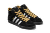 A pair of ADIDAS X SNEEZE SUPERSKATE CORE BLACK / FTWR WHITE / GOLDEN BEIGE sneakers with yellow laces.