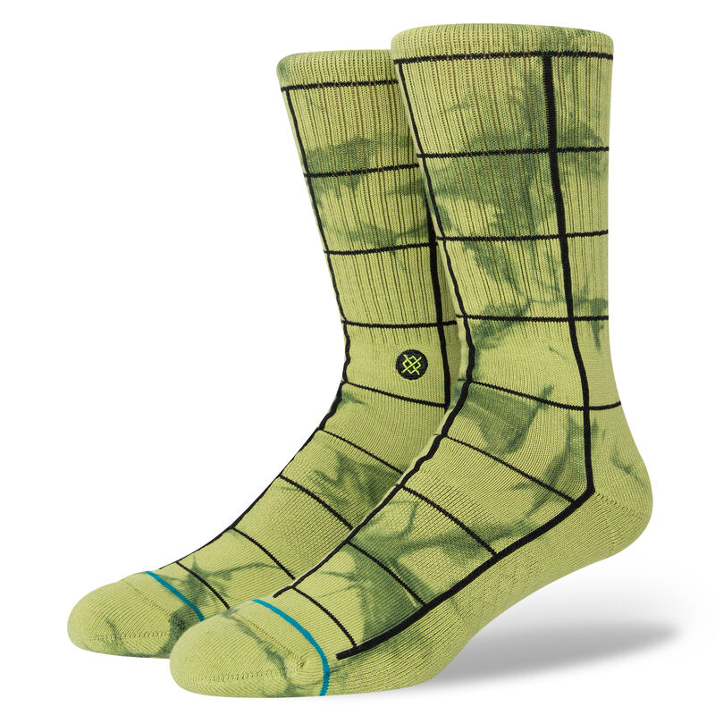 A pair of STANCE SOCKS GRAPHED GREEN LARGE with green leaves on them.