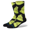 The STANCE X THE GRINCH MEAN ONE BLACK LARGE socks by STANCE feature a design of multiple green faces with grumpy expressions inspired by The Grinch.